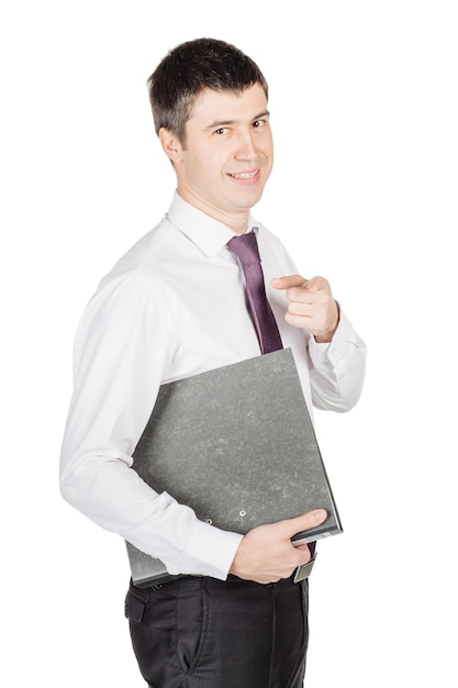 Portrait of young business man holding a grey folder isolated on white background