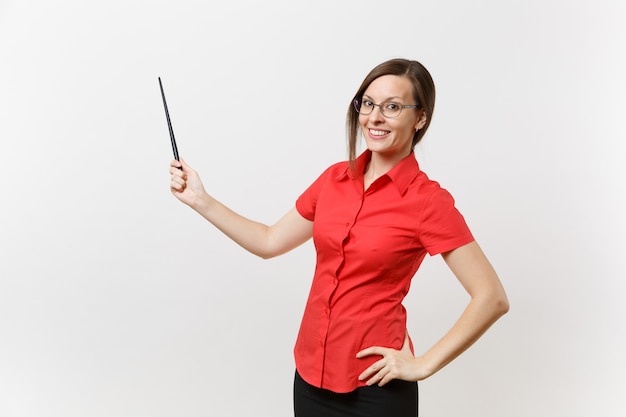 Portrait of young business teacher woman in red shirt skirt glasses holding wooden classroom pointer on copy space isolated on white background. Education teaching in high school university concept.