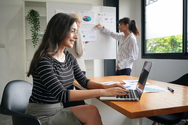 Portrait of young business woman in modern office