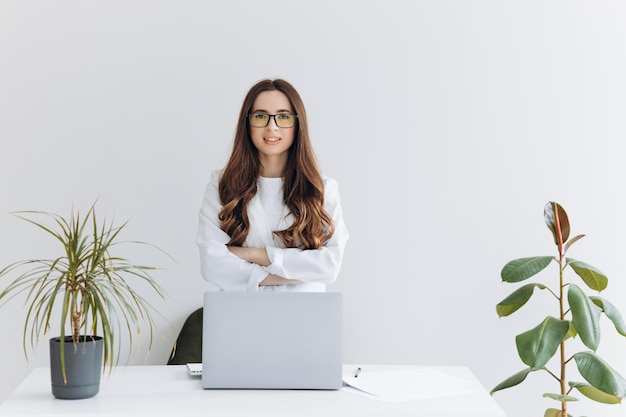 Portrait of a young business woman in an office