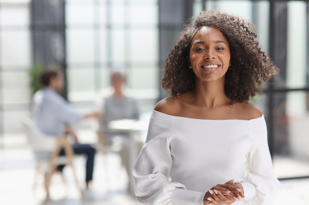 Portrait of young business woman working in the office