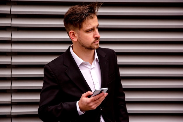 Portrait of a young businessman waiting