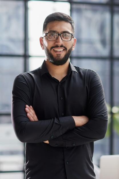 Portrait of a young businessman who is smiling