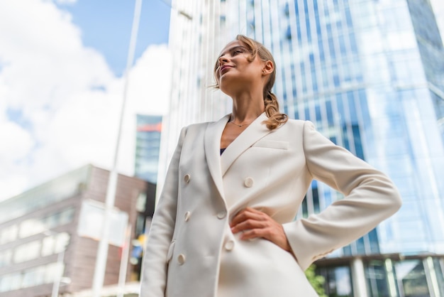 Portrait of a young businesswoman near her office