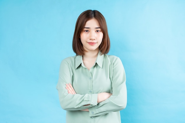 Portrait of young businesswoman on white background