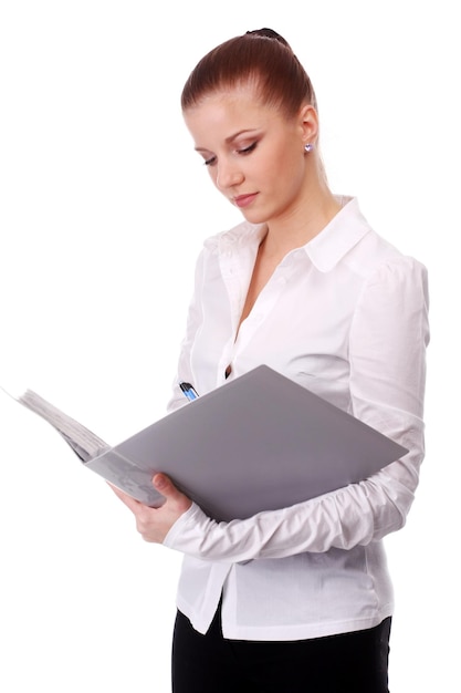 Portrait of young businesswoman with grey folder