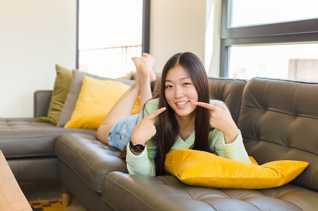 Portrait of young cheerful woman