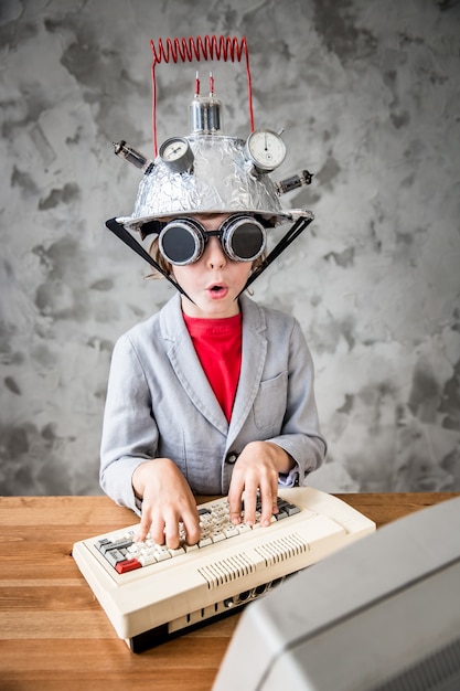 portrait of young child pretend to be businessman