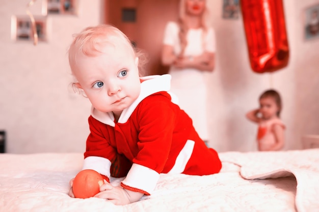 Portrait of a young child with blue eyes in a room