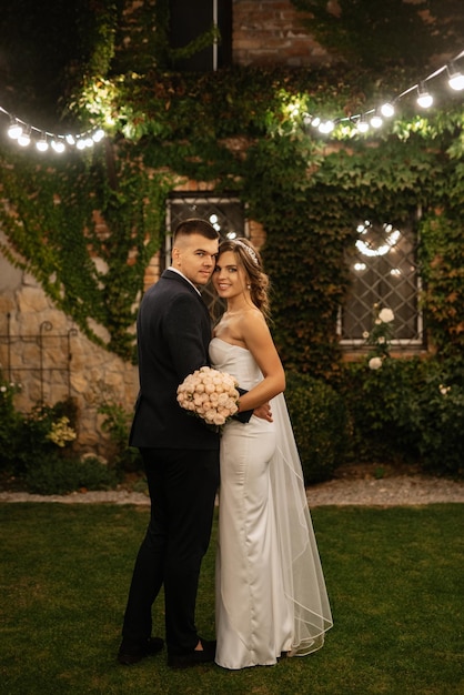 Portrait of a young couple of bride and groom on their wedding day