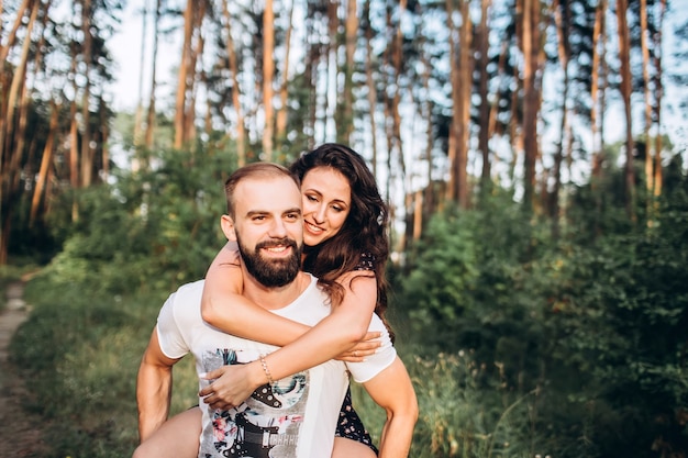 portrait of a young couple in the forest