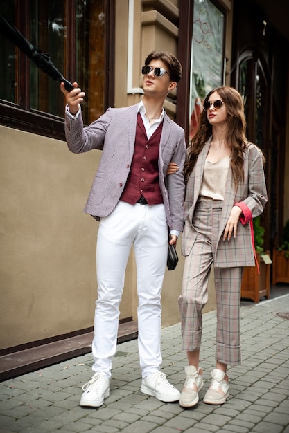 Portrait of young couple in formal clothes