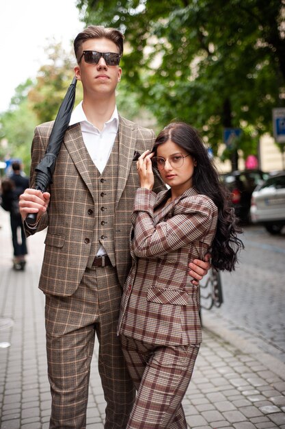 Portrait of young couple in formal clothes