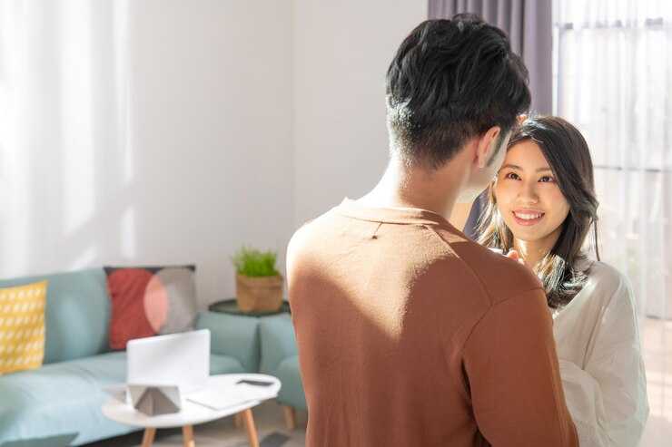 Photo 家にいる若い夫婦の肖像画