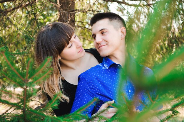 Portrait of young couple in love in a park