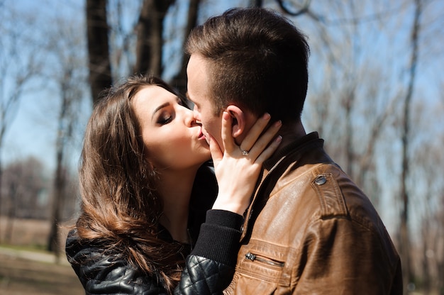 Portrait of young couple in love in a park