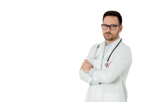 Portrait of young doctor isolated on the white