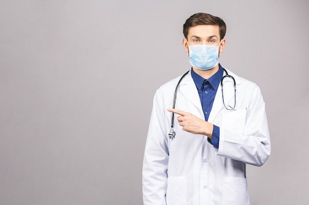 Portrait of young doctor in mask