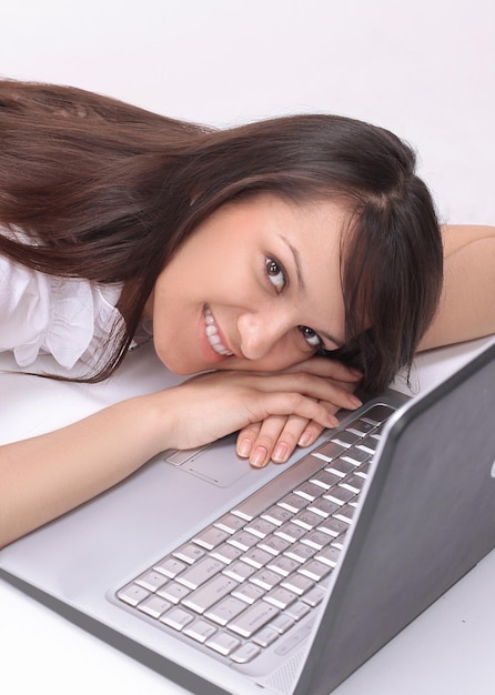 Portrait of a young employee behind her Desk