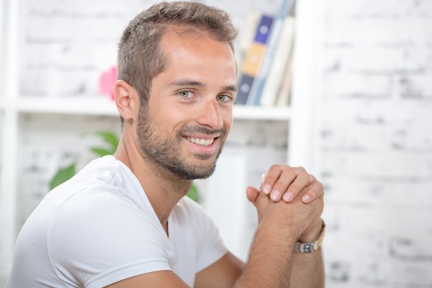 Portrait of a young executive in his office