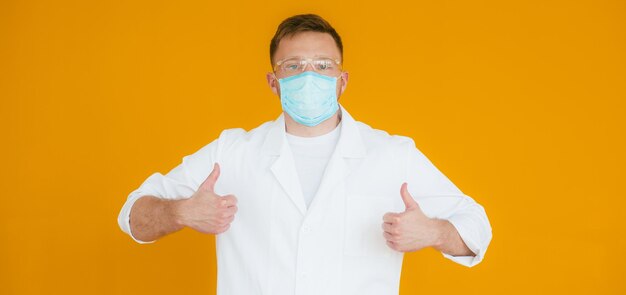 Portrait young exhausted doctor in blue medical mask on face Prevention of coronavirus nCov19