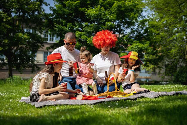 Portrait of a young family with children on a picnic