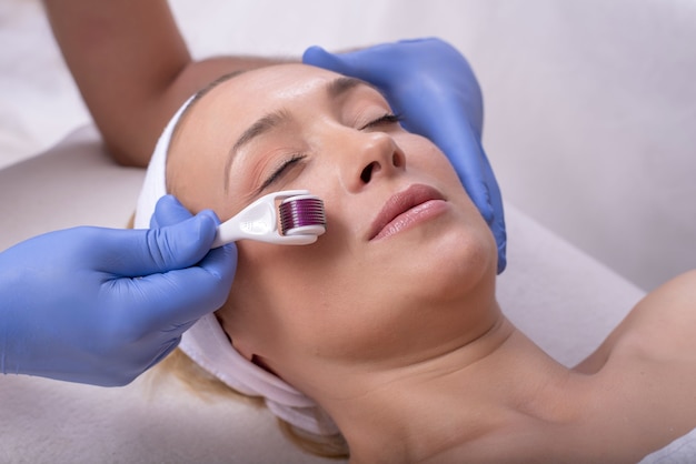 Portrait of a young female in a beauty salon during a mesotherapy procedure