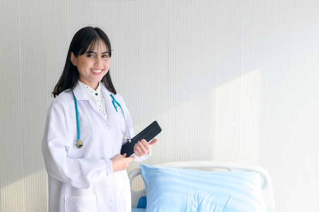 Portrait of young female doctor with stethoscope working at hospital medical and health care concept