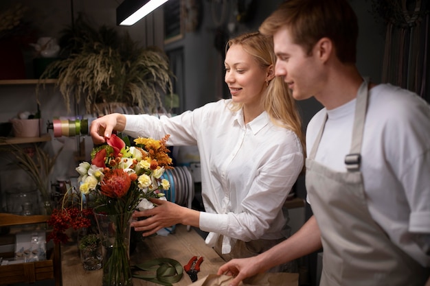 Portrait of young florists working together