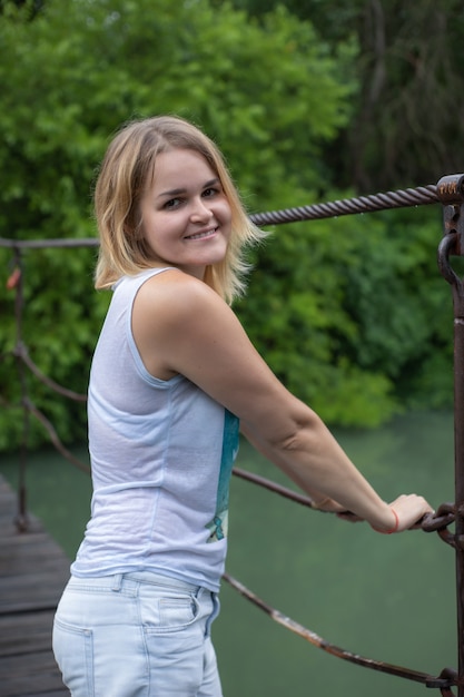 portrait of a young girl on the bridge