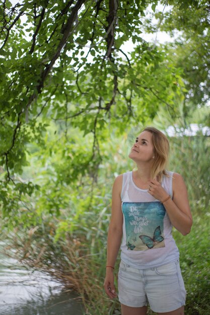 portrait of a young girl by the river