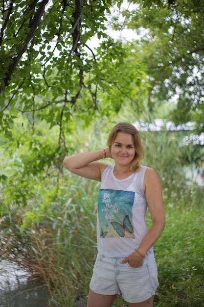 portrait of a young girl by the river