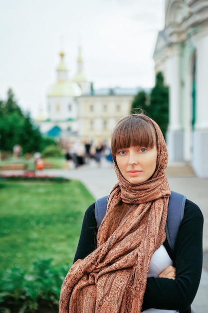 Portrait of a young girl in Holy Trinity Seraphim Diveevo monastery in Diveevo in Russia.