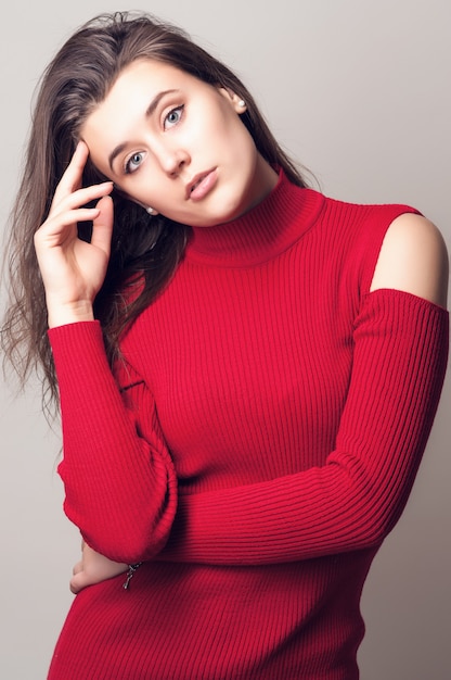 portrait of a young girl in a red blouse