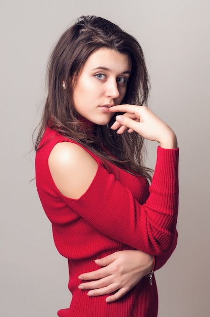 portrait of a young girl in a red blouse