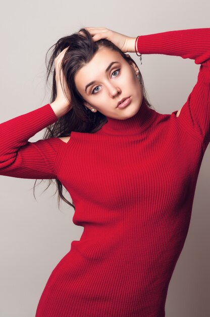 portrait of a young girl in a red blouse