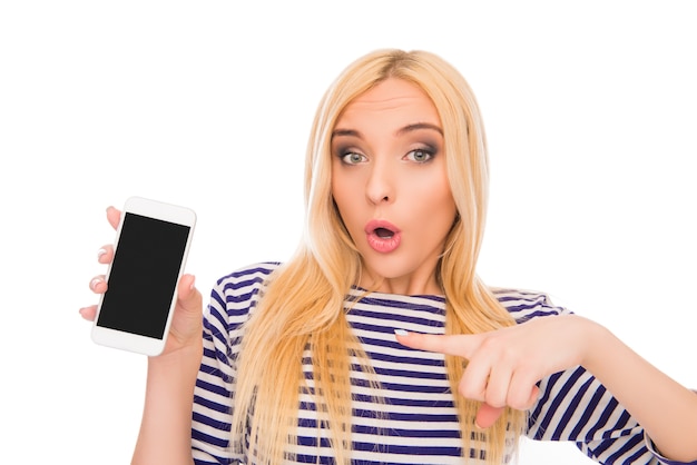 Portrait of young girl showing black screen of her phone