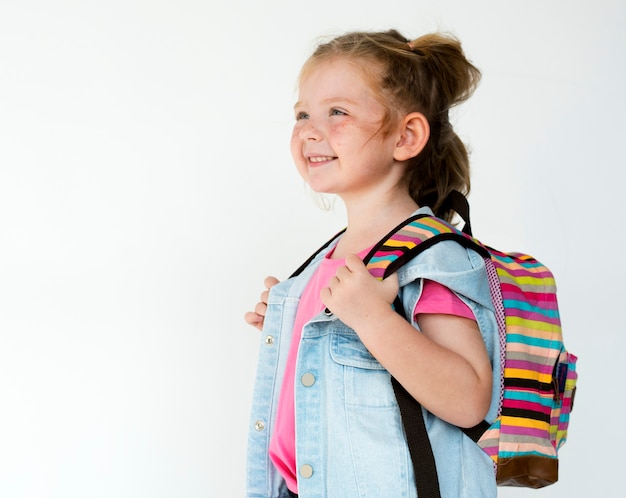 Portrait of a young girl with a backpack