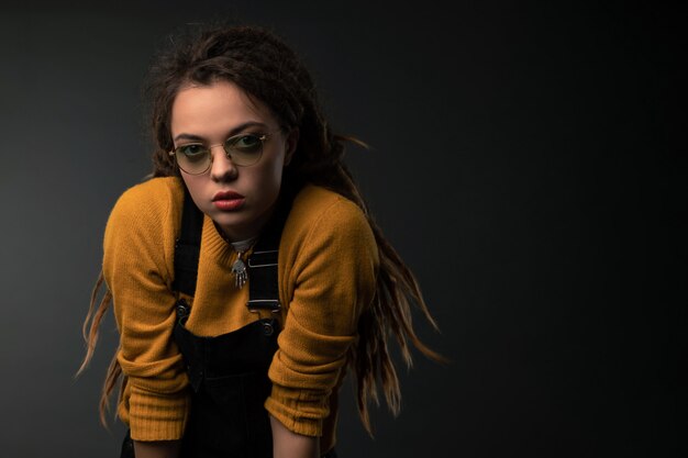 Portrait of a young girl with dreads 