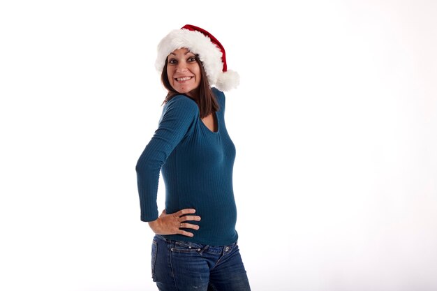 Portrait of a young girl with a Santa Claus hat on a white background