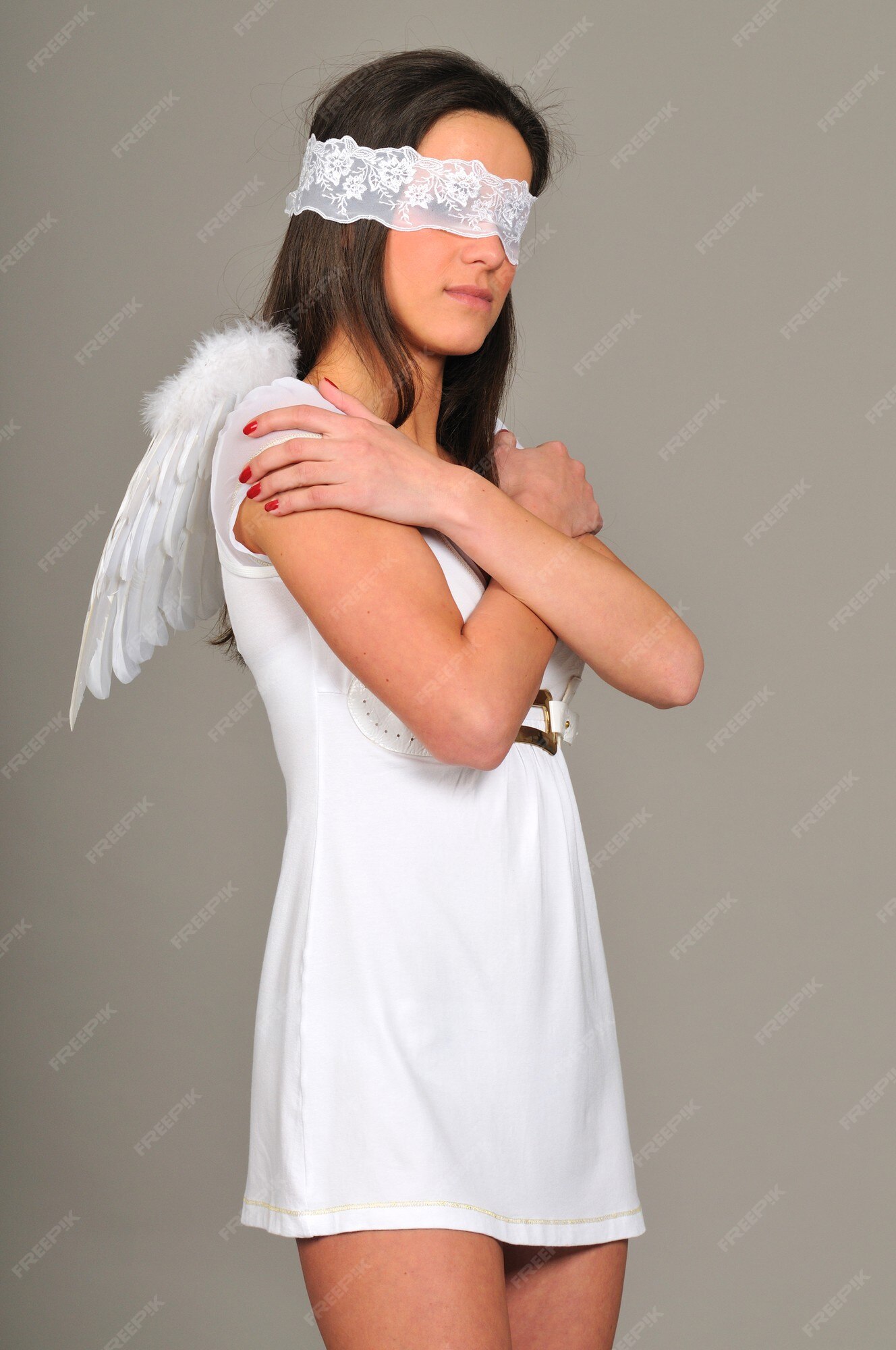 Young Woman Wearing Black Blindfold Isolated On Grey Stock Photo