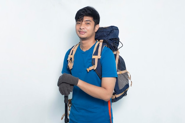 Portrait young handsome asian hiker man with a backpack isolated on white background