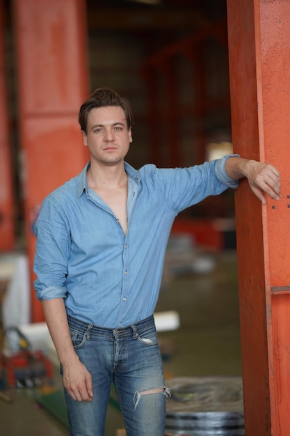 Portrait of a young handsome confident on casual outfit standing outdoor