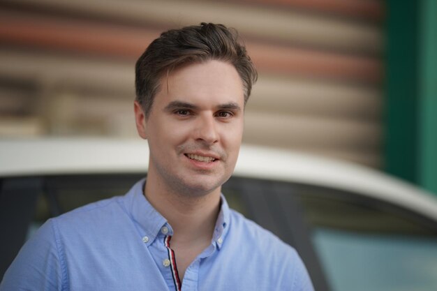 Portrait of a young handsome confident on casual outfit standing outdoor