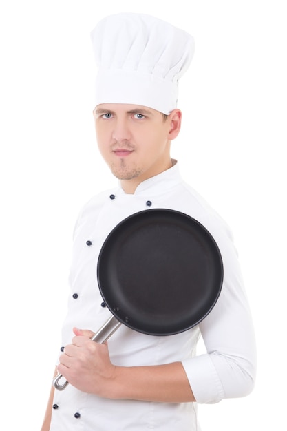 Portrait of young handsome man chef in uniform with teflon frying pan isolated on white background