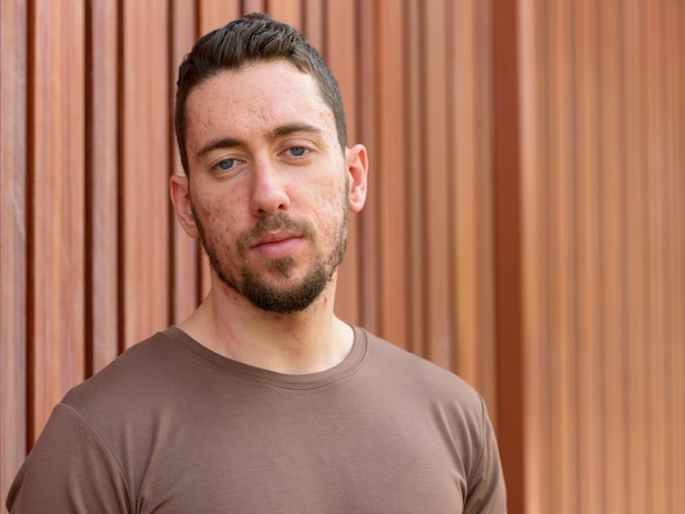 Portrait of young handsome man outdoors