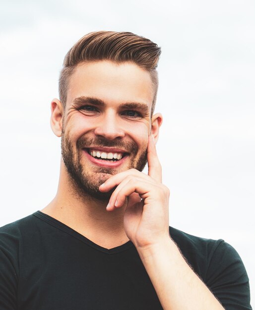 Portrait Of Young Handsome Man Smiling Outdoor