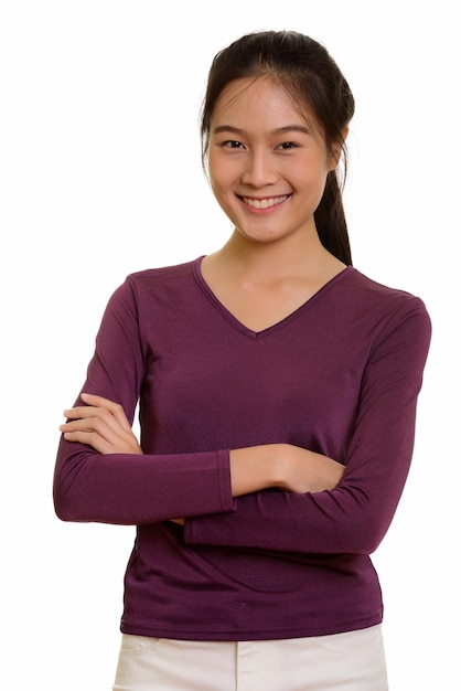 Portrait of young happy Asian teenage girl smiling