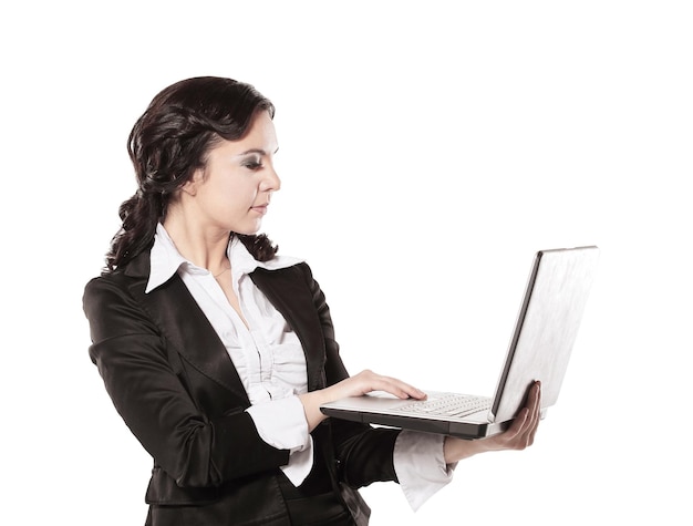 Portrait of a young happy business woman with a laptop over white background