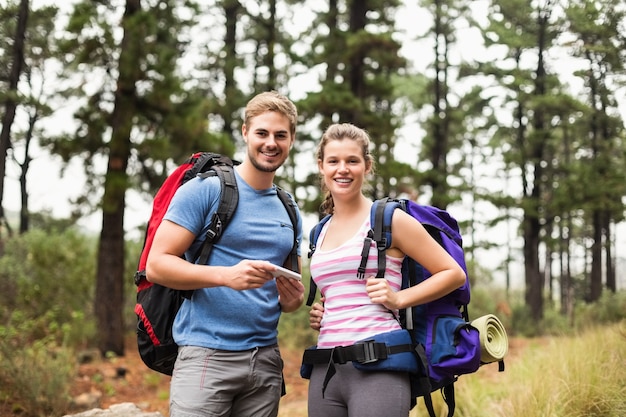 Portrait of young happy hikers